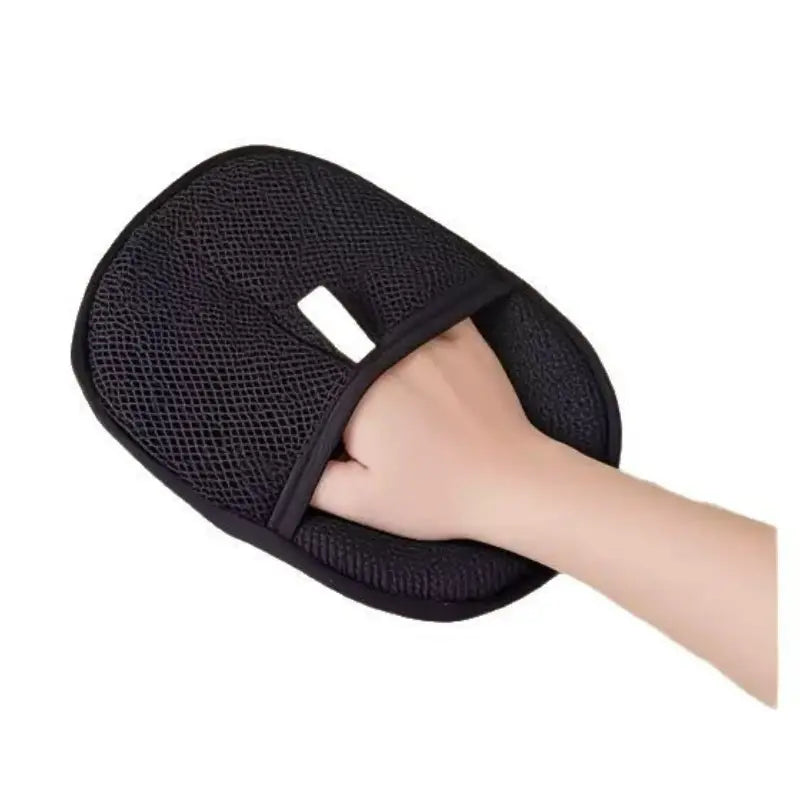 Cat Hair Lift-Off Mitt — black mesh fur-remover mitt worn on hand
