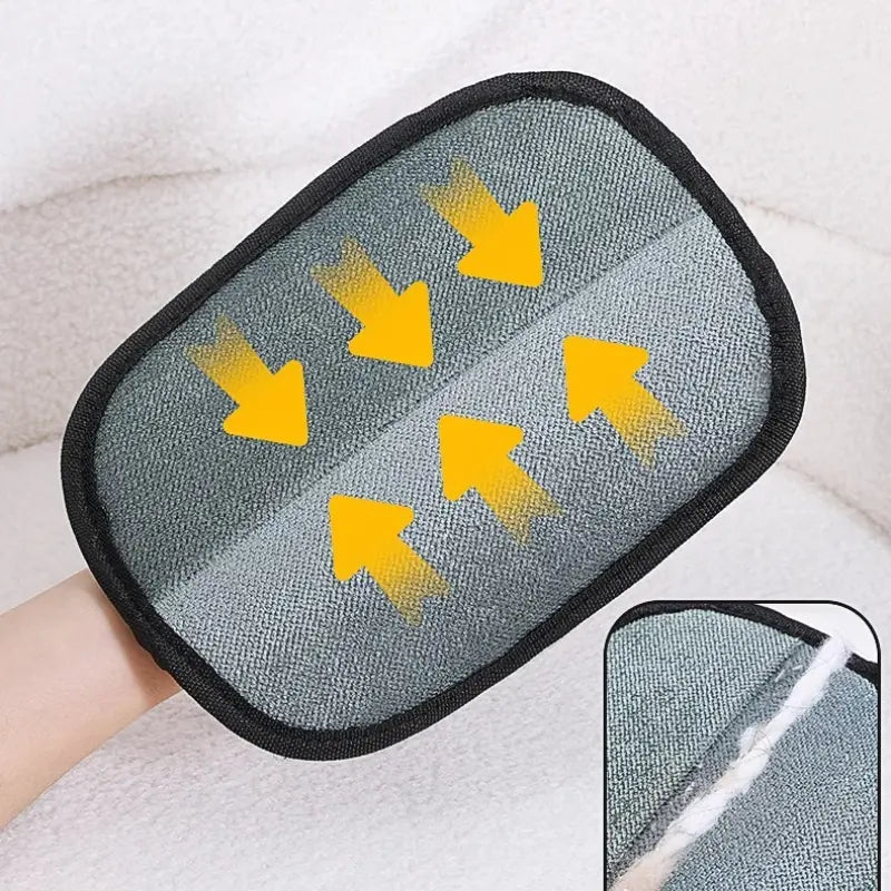 Gray mitt with yellow arrows showing how textured mesh captures loose cat hair