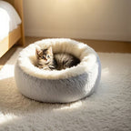 Tabby cat curled in Donut Cuddler Bed