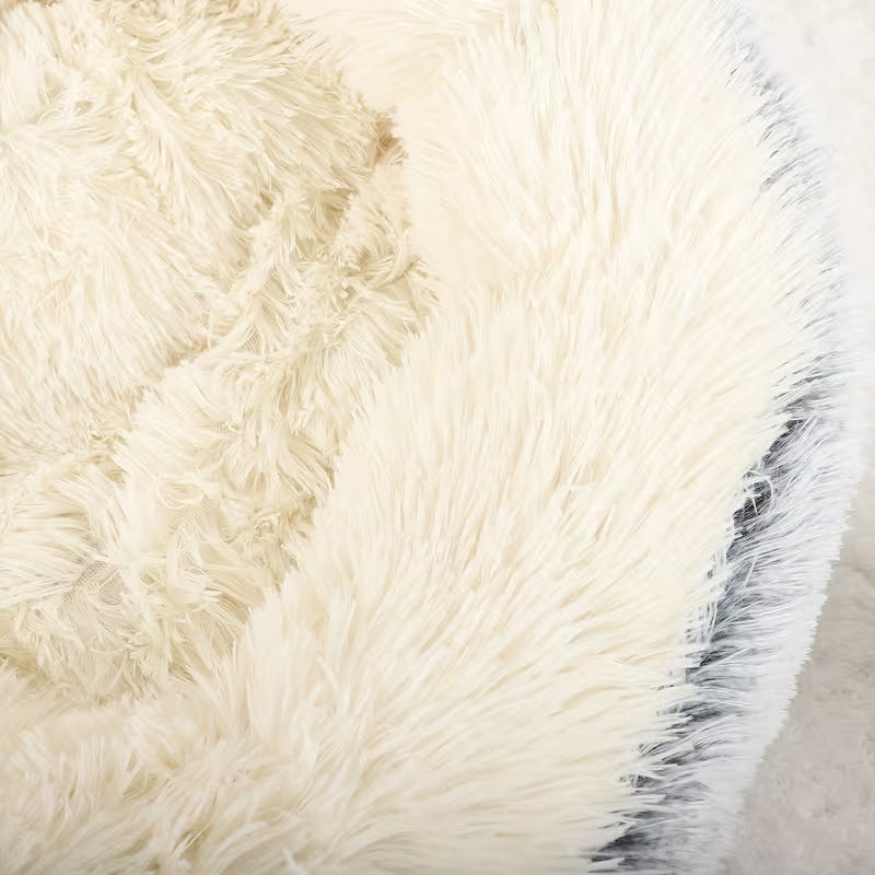 Close-up of cream faux fur showing plush texture
