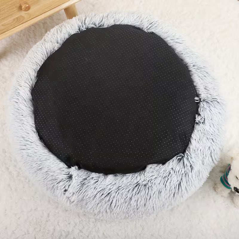 Top-down view of gray Donut Cuddler Bed with raised rim