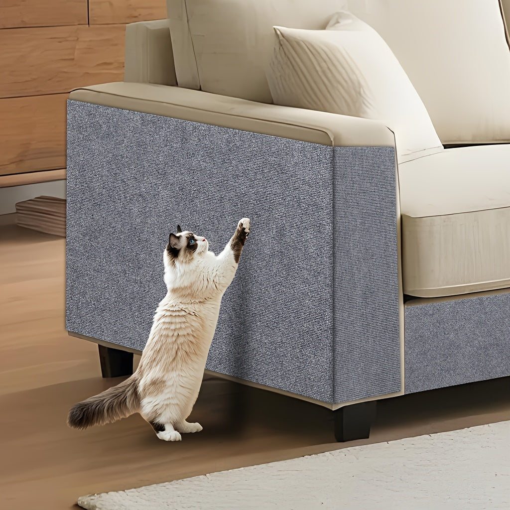 Cat scratching the Scratch Guard Mat wrapped around a couch corner