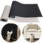 Scratch Guard Mat in black on a wall and couch